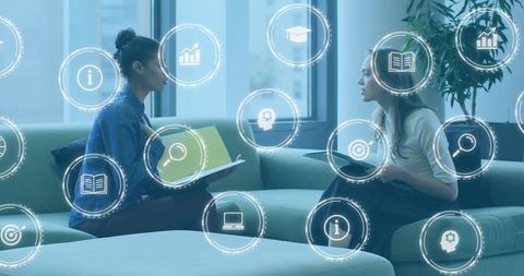 Colleagues Discussing Strategy in Modern Office Lounge with Augmented Digital Interface