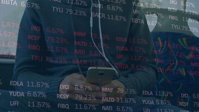 Midsection of man on bus, engrossed in analyzing stock market data. Thin overlay of financial information symbolizes data processing, key for travel or finance-related projects. Appropriate for illustrating themes of trading, technology in business, and mobile connectivity.