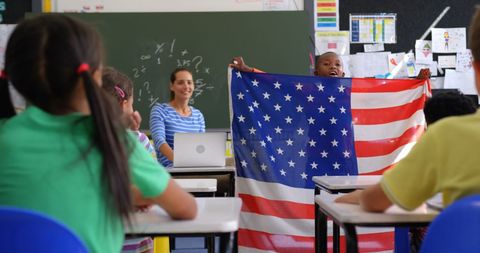 Diverse Classroom Presentation on American Flag