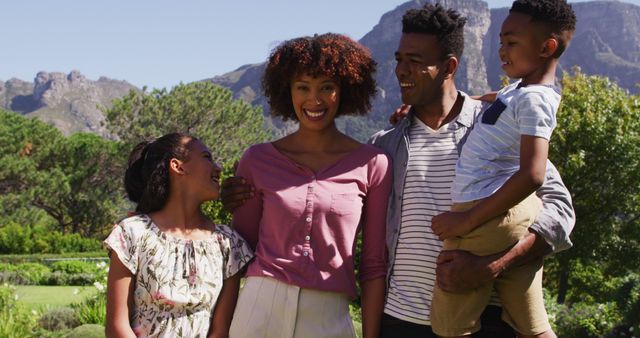Portrait of happy african american parents, daughter and son standing outdoors - Download Free Stock Photos Pikwizard.com