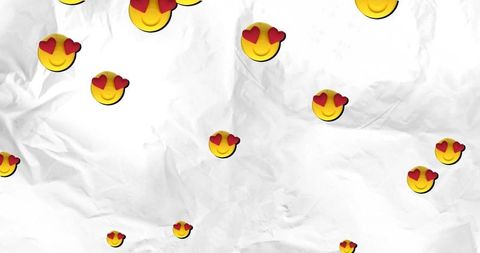 Heart eyes emojis on textured white background