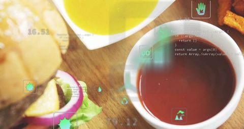Showing ketchup cup and burger with augmented reality ui overlays for food tech concept
