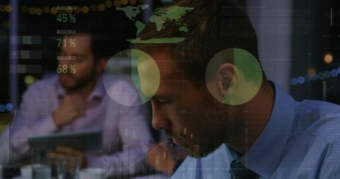 Leaning analyst analyzing financial data with digital overlays in evening office