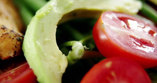 Macro Close-up of Fresh Avocado and Cherry Tomato Salad - Download Free Stock Images Pikwizard.com