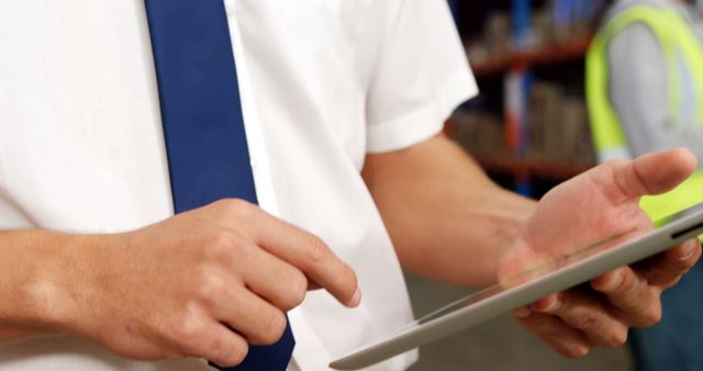 Warehouse Manager Using Tablet for Inventory Management - Download Free Stock Images Pikwizard.com