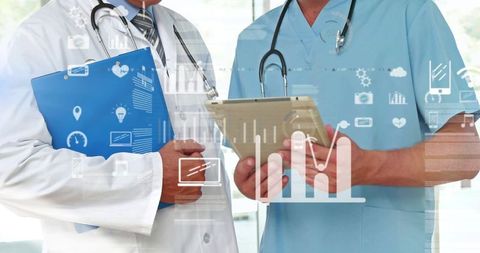 Doctors Analyzing Digital Data on Tablet in Modern Hospital