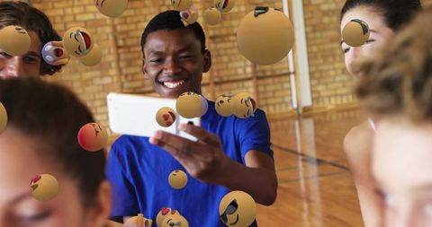 Happy Teenagers Taking Selfie with Emojis in School Gym