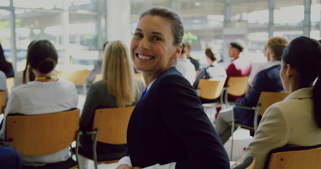 Confident Businesswoman Smiling During Presentation - Download Free Stock Images Pikwizard.com