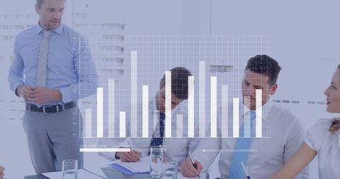 Diverse Professionals Collaborating with Digital Graph Overlay in Office - Download Free Stock Images Pikwizard.com