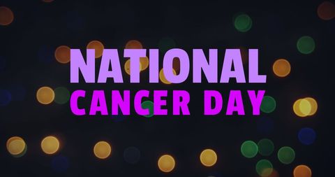 National Cancer Day Text Amidst Colorful Bokeh Lights