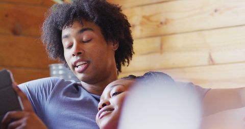 Relaxed Couple Enjoying Time Together in Cozy Cabin