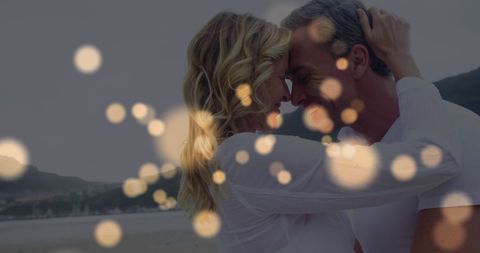 Romantic Couple Embracing with Dreamy Light Spots