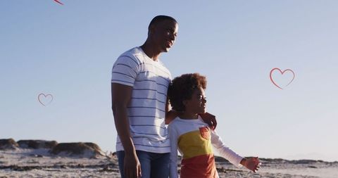 Father and Son Bonding at Sunset Beach with Added Hearts