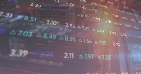 Dynamic Financial Data Over Cityscape at Dusk