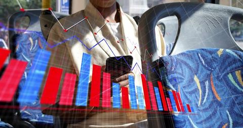Commuter checking smartphone on bus with financial charts overlay and data dashboard