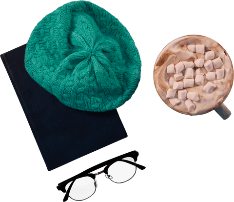 Transparent cozy winter accessories with hot chocolate and book