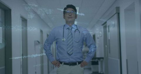 Confident chinese doctor standing hands on hips in hospital corridor with ecg overlay