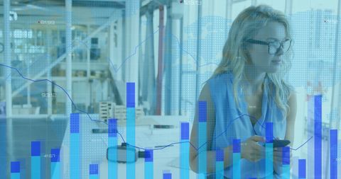 Businesswoman Analyzing Financial Data with Digital Overlay in Modern Office