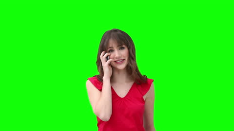 Smiling Woman Conversing on Phone Against Green Screen