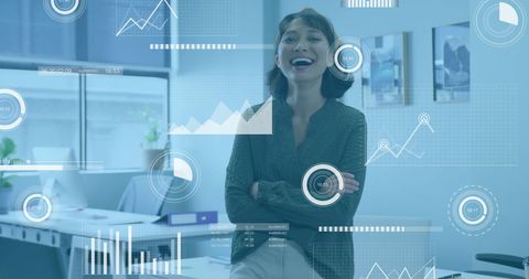 Businesswoman Enthusiastically Analyzing Data with Digital Interfaces - Download Free Stock Images Pikwizard.com