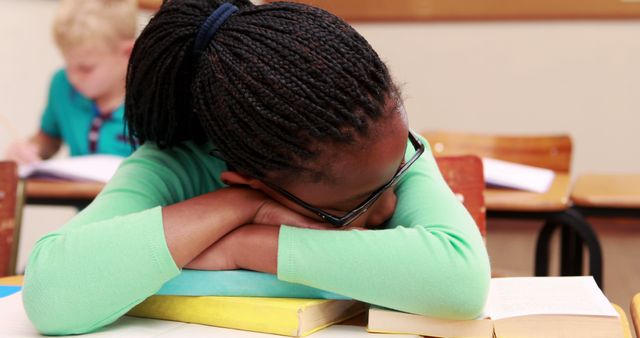 Tired Student Sleeping on Books in Classroom - Download Free Stock Images Pikwizard.com