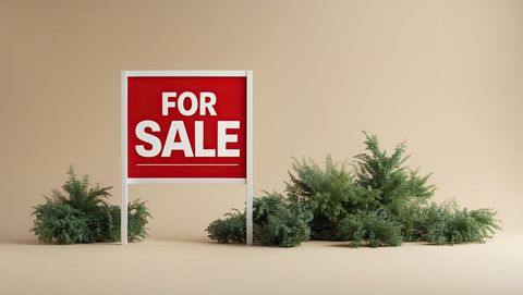 For sale sign in minimalist natural setting for real estate
