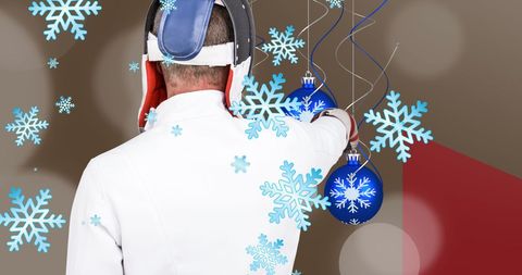Fencer celebrating festive season with decorative baubles