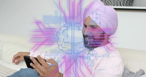 Man wearing turban using smartphone on sofa with neural ai brain overlay