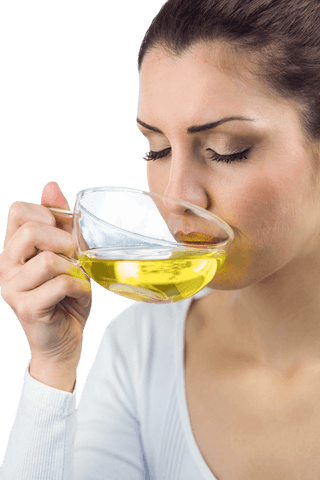 woman drinking herbal tea with eyes closed on transparent background - Download Free Stock Videos Pikwizard.com