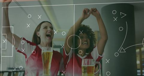 Diverse Friends Celebrating Football Game at Bar