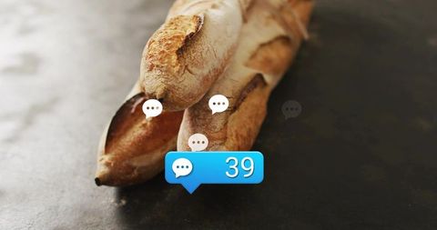 Crusty baguette conversation concept with blue notification badge 39 on dark slate