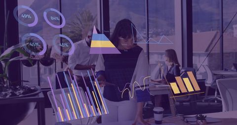 Diverse professionals analyzing dynamic financial data in office