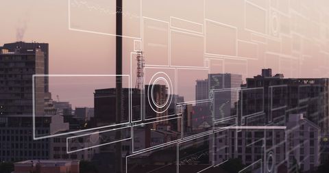 Futuristic Digital Interface Over Cityscape Backdrop