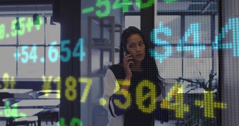 Financial Professional Analyzing Digital Stock Data in Modern Office