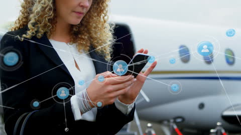 Businesswoman on Smartphone with Network Connections at Airport