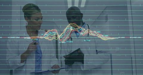 Medical professionals reviewing healthcare analytics in hospital