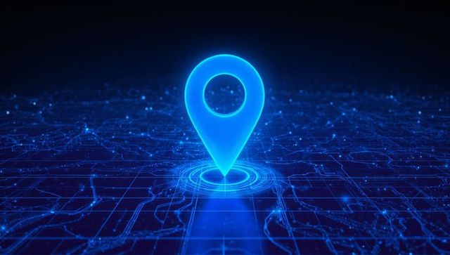 Glowing blue location marker hovering over holographic digital map with neon circuit grid