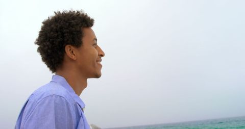 Happy Man Enjoying Scenic Beach View