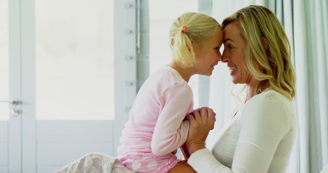 Happy Mother and Daughter Sharing Loving Moment Indoors - Download Free Stock Images Pikwizard.com