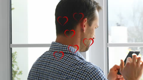 Man Receiving Heart Messages on Smartphone