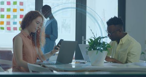 Diverse Professionals Collaborating with Digital Interface in Modern Office - Download Free Stock Images Pikwizard.com