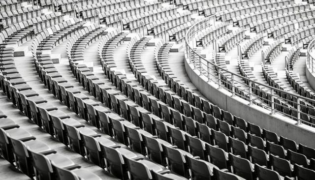 Empty stadium seats curving rows monochrome geometry leading lines perspective