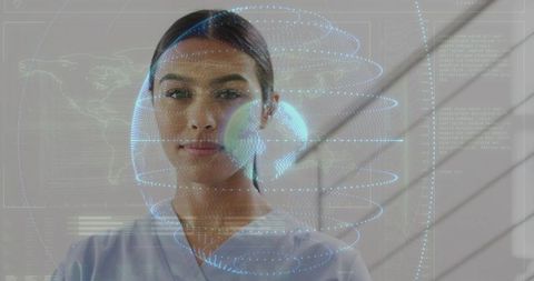 Female clinician presenting holographic 3d globe with futuristic medical data overlay