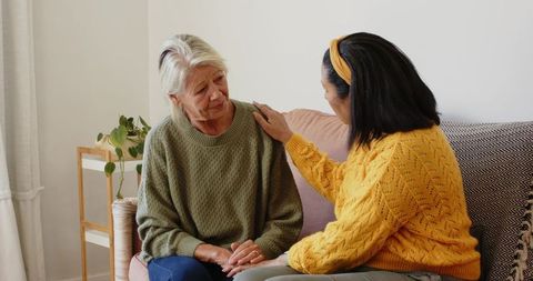 Supportive Friends Comforting Each Other at Home