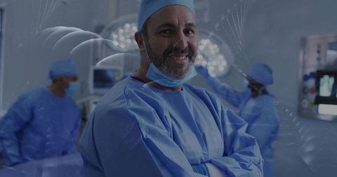 Confident Surgeon Leading Surgical Team in Operating Room