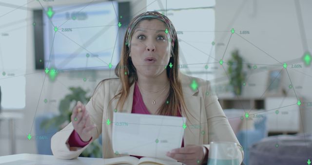 Businesswoman Analyzing Data with Augmented Reality in Modern Office - Download Free Stock Images Pikwizard.com