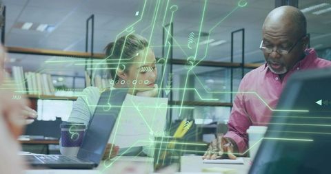 Collaborative team discussing projects in modern office with digital overlay