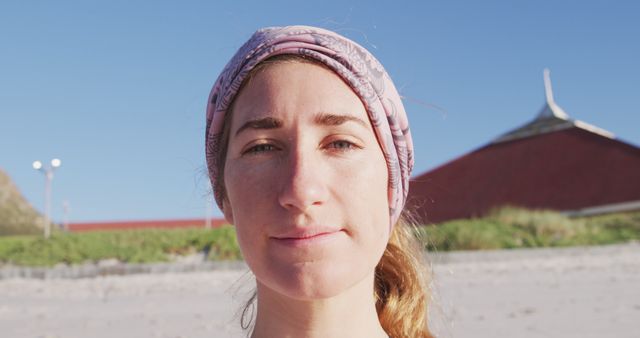 Young Woman Enjoying Sunny Day at Beach - Download Free Stock Images Pikwizard.com