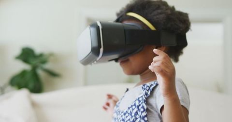 Joyful Child Exploring Virtual Reality at Home