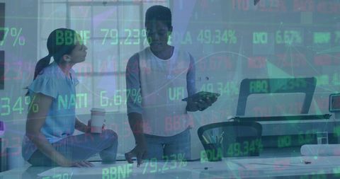 Diverse Colleagues Analyzing Financial Data and Technology